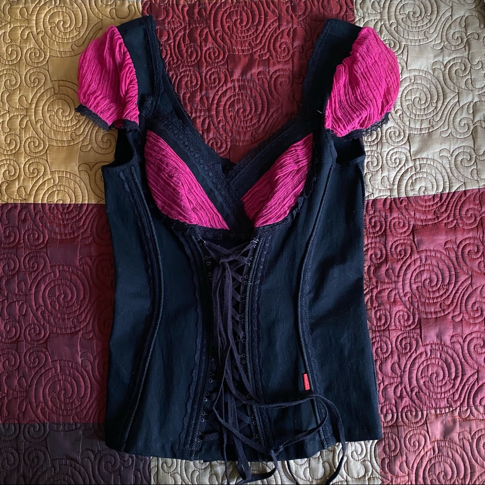 pink rare tripp nyc corset